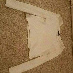 I am selling a cropped long sleeved shirt.